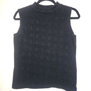 Jet black cable-knit sleeveless mock turtleneck